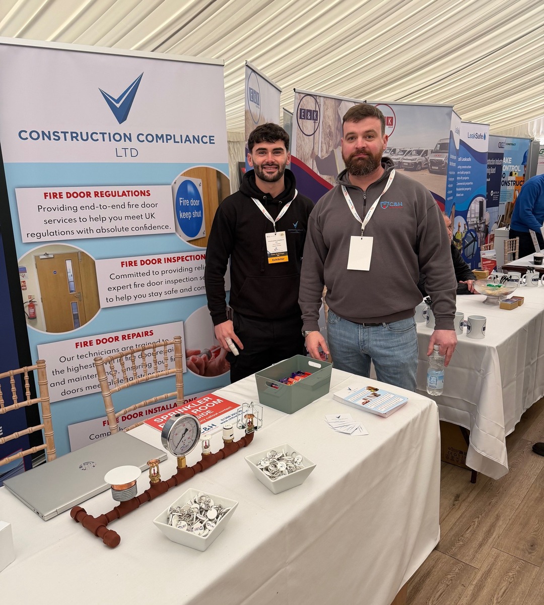 Construction compliance engineer reviewing fire door and fit out scope