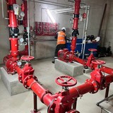 Construction Compliance engineer reviewing project controls