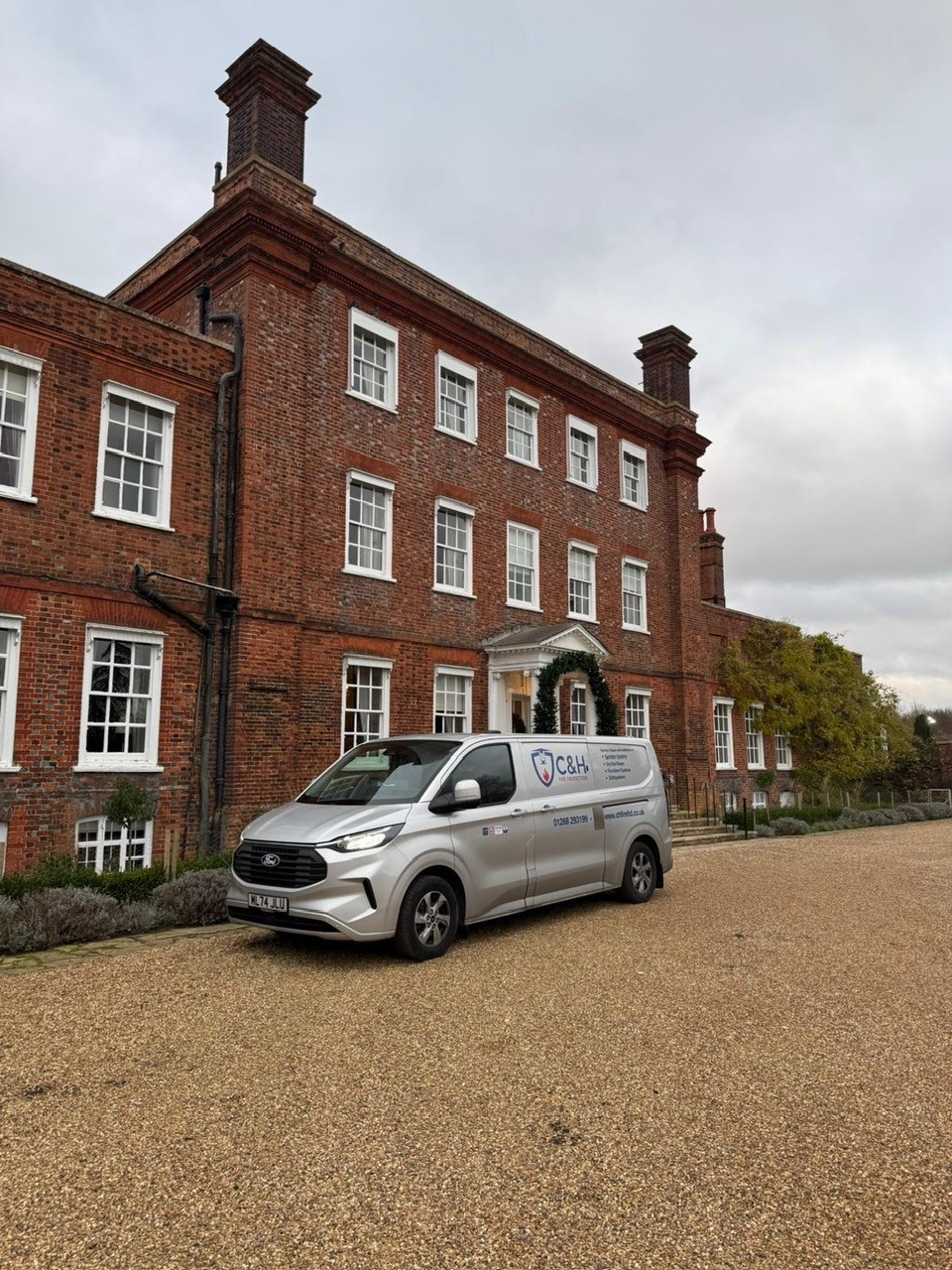 Engineer conducting construction compliance survey on site